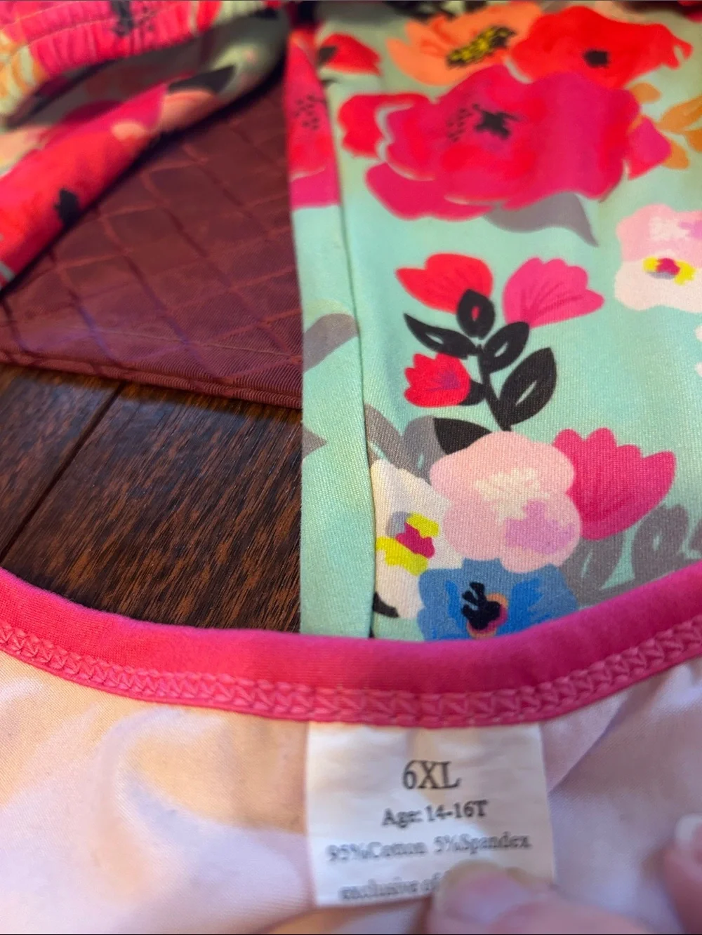 Girls Bright Pink 'Mama's Girl' Top with Floral Bell-Bottom Leggings.